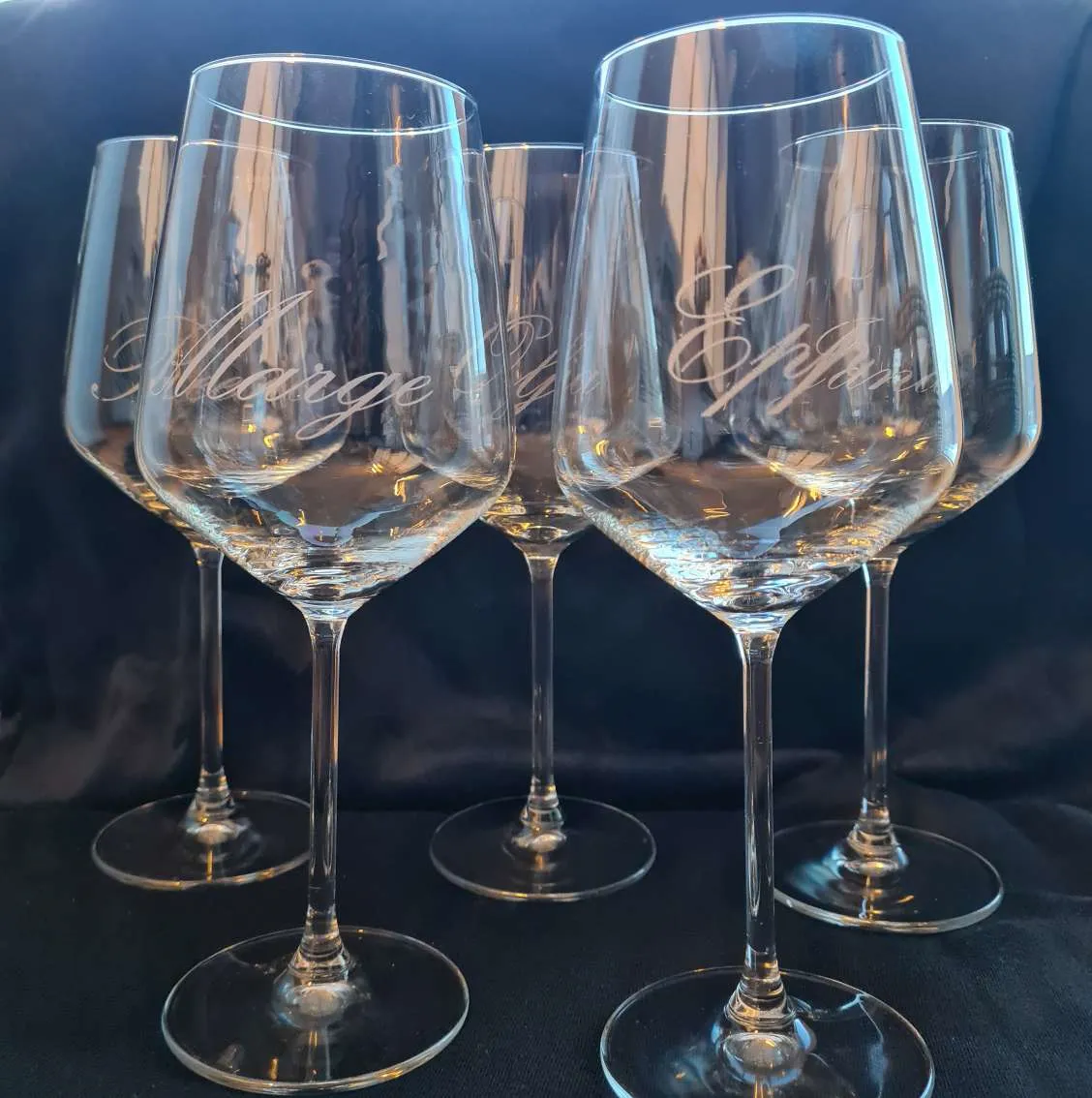 Engraving on a glass goblet with marking paper. image 1